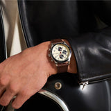 Wristwatch on a person's wrist.