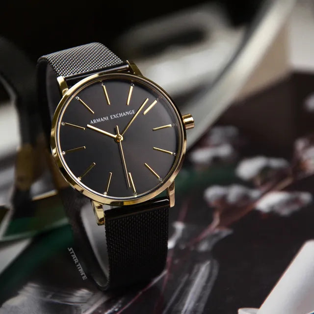 Black and gold Armani Exchange wristwatch.