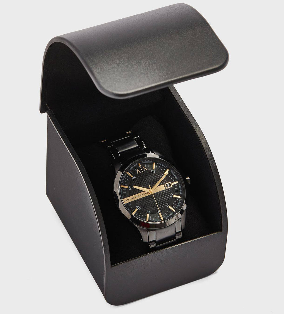 Black AX watch in display case