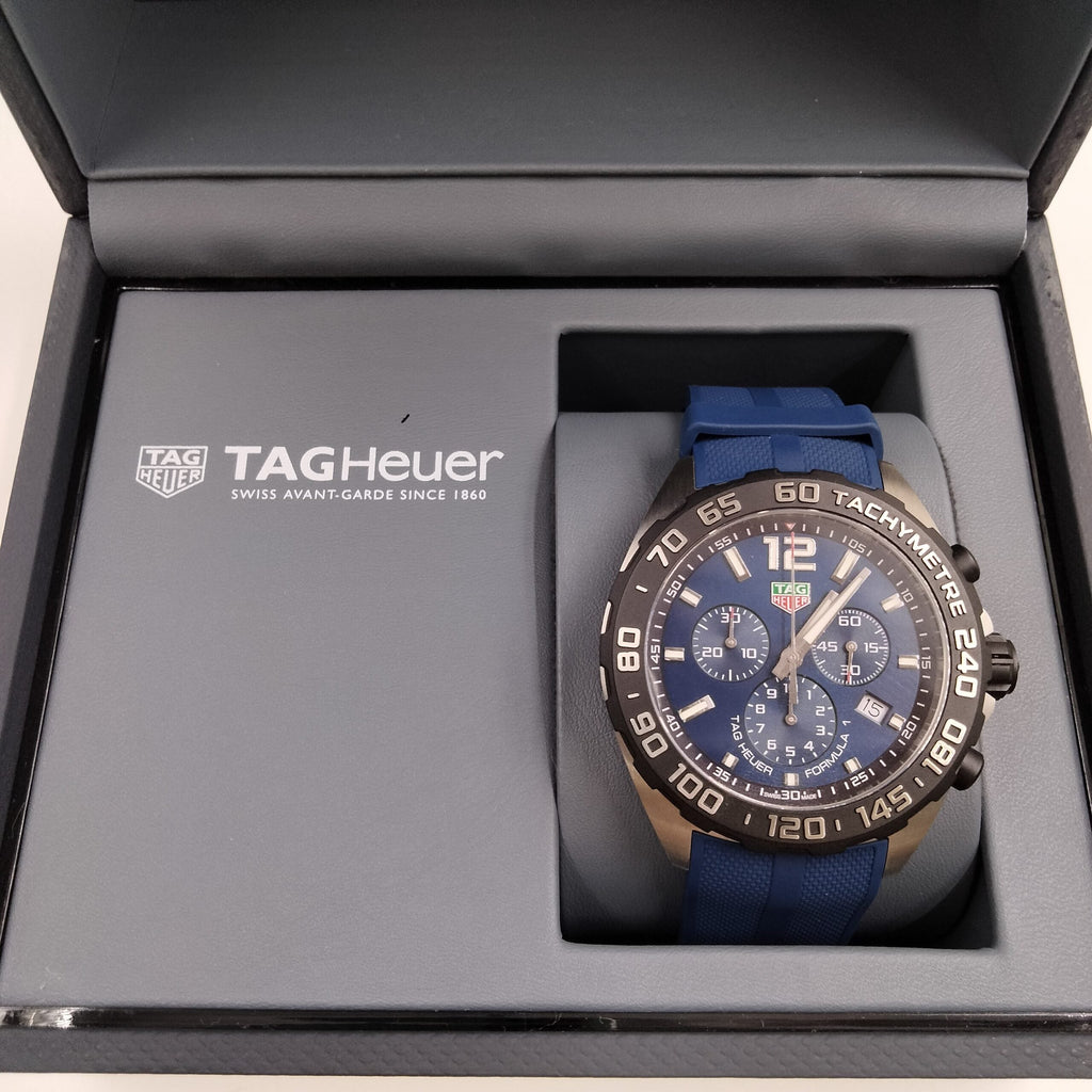 Tag Heuer watch in box.