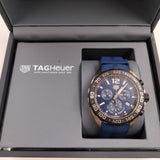 Tag Heuer watch in box.
