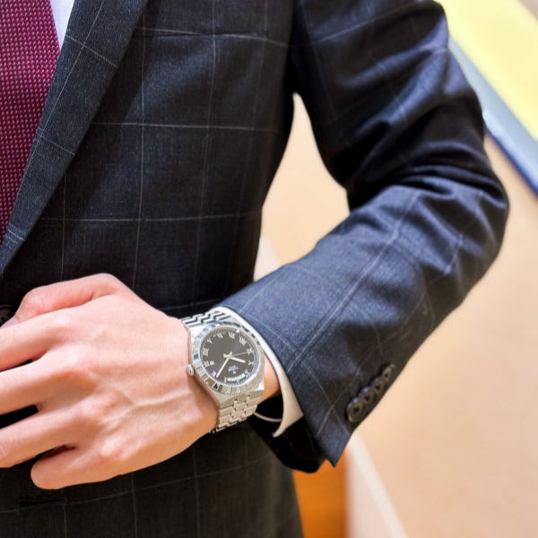 Tudor 40-15 watch on man in suit, February 2024