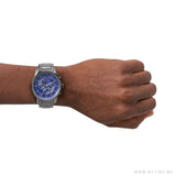 Men's watch on wrist with blue face, product 25517
