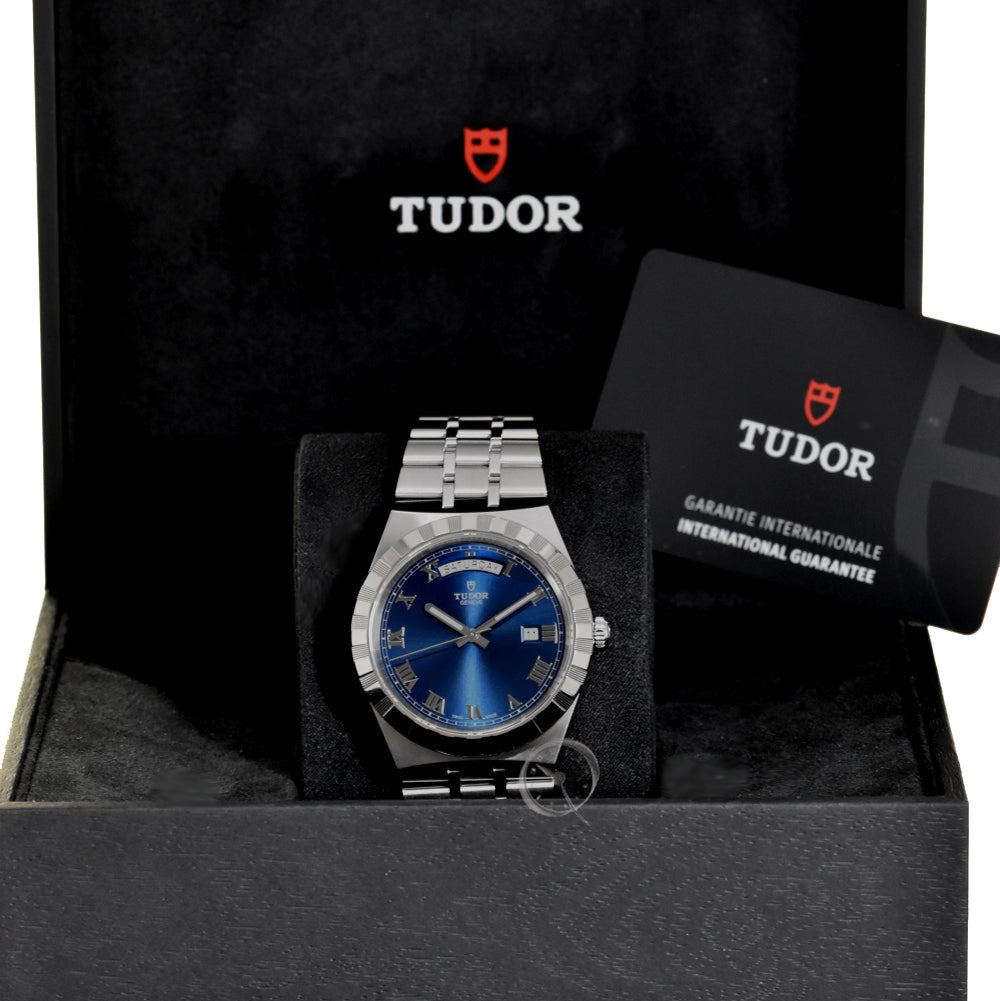 Tudor watch in box with guarantee card.