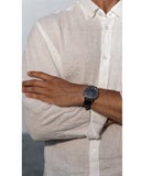 Man in white shirt with watch (296DG5B6-5)