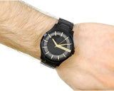 Black Armani Exchange watch on wrist