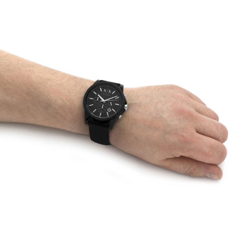 Black AX watch on wrist