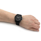 Black AX watch on wrist