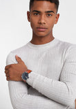 Man wearing a Fossil watch