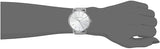 Silver watch on wrist, 42ffe525d13d947f098473f50d15e8788