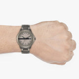 Gunmetal watch on wrist