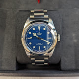 Tudor watch with blue face, 4c2e1f9a-8b96-462a-aa80-d9ba8aecb58e