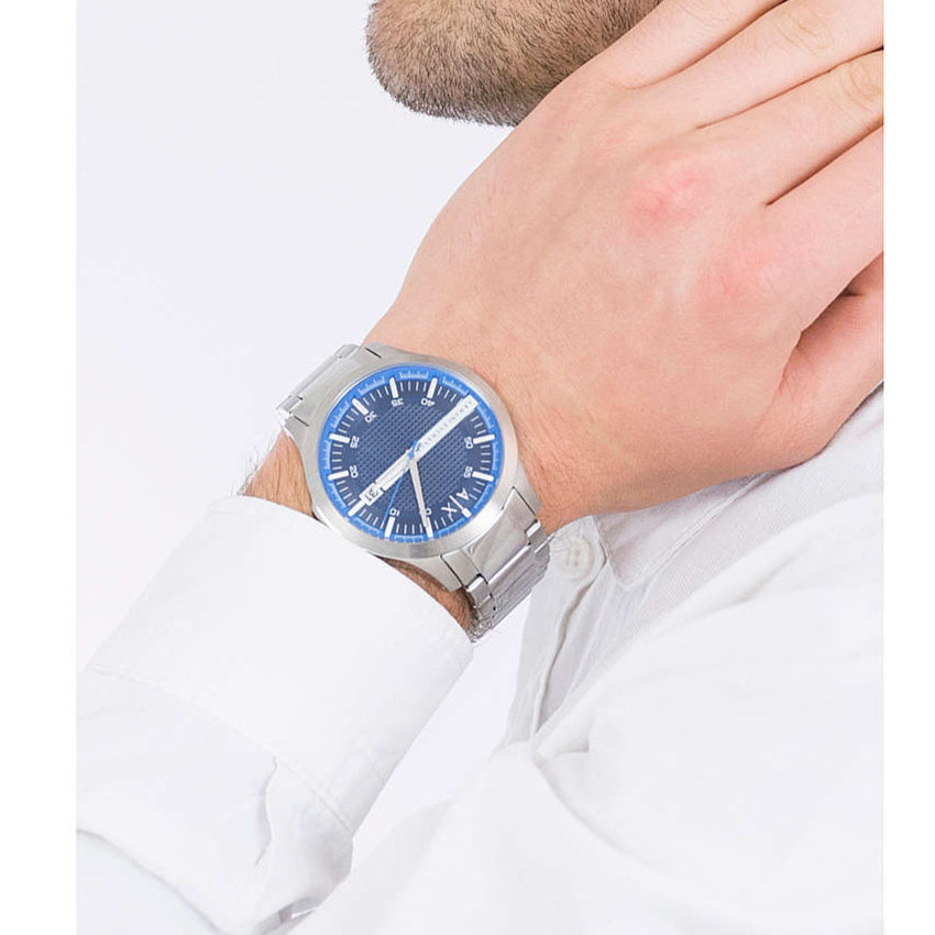 Man wearing blue dial watch, product image