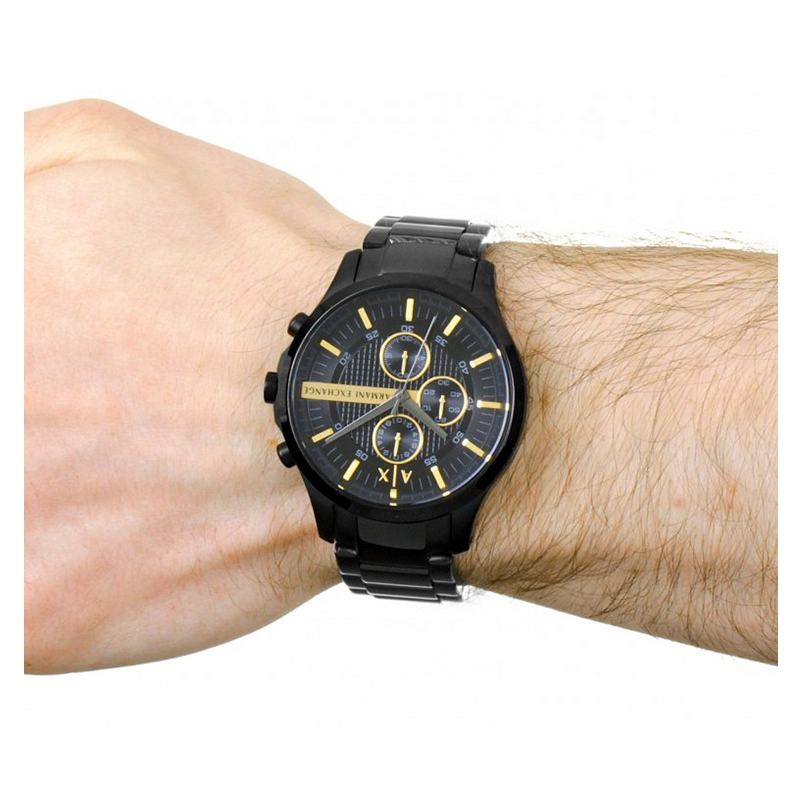 Armani Exchange black watch on wrist