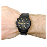 Armani Exchange black watch on wrist