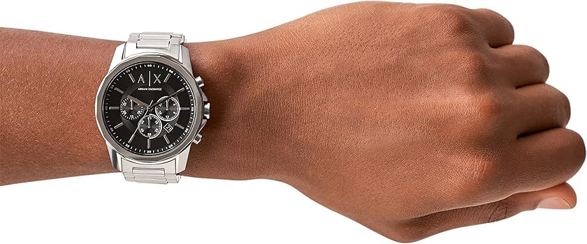 Men's silver watch on wrist, product image.