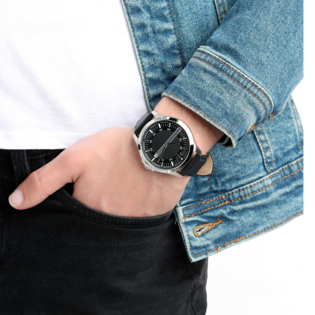 Man wearing a black watch, 9RDcKT4vLqdZxhFy