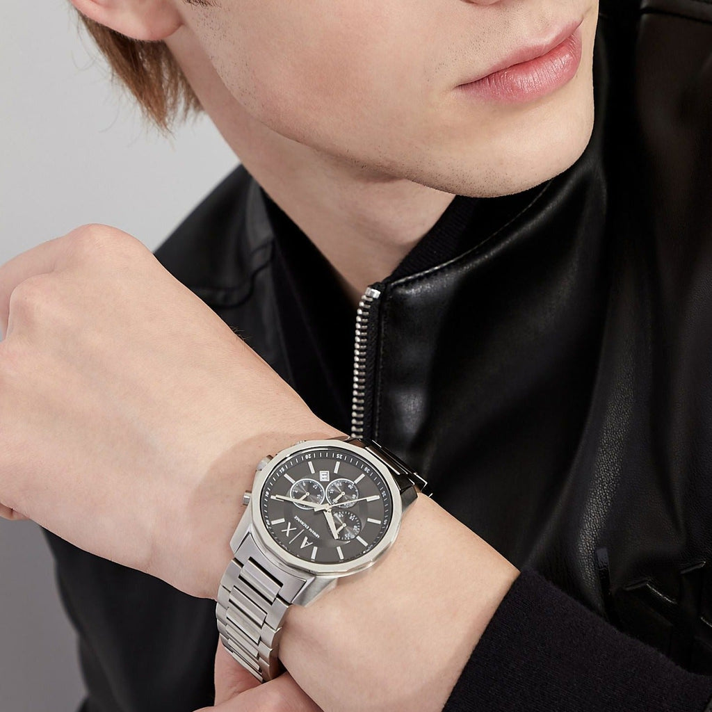 AX1720 watch on wrist, man wearing silver watch