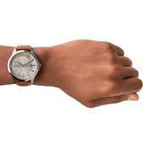 AX2414H watch on wrist with brown leather strap