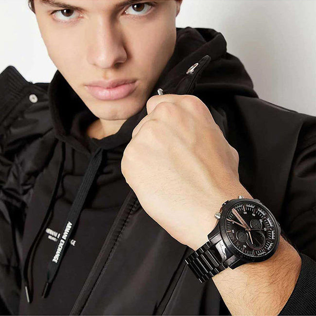 AX2429 black watch on man's wrist