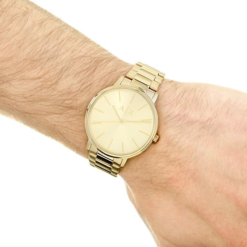 Armani Exchange gold watch AX2707 on wrist
