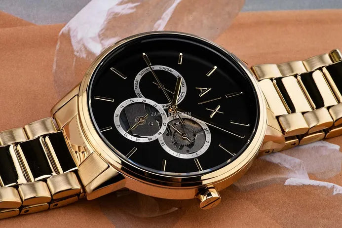 Armani Exchange gold watch detail