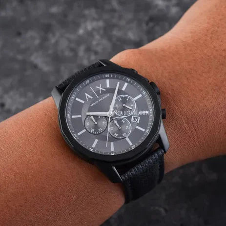 Black Armani Exchange watch on wrist