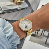 Gold Fossil watch detail