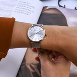 silver face and rose gold trim