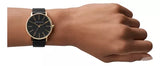 Black and gold watch on wrist, D_NQ_NP_725630