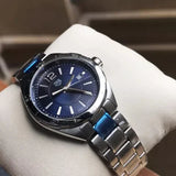 TAG Heuer watch with blue face