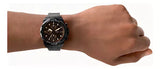 Black watch on wrist, product D_NQ_NP_868599.