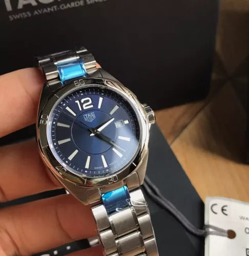 TAG Heuer watch with blue face