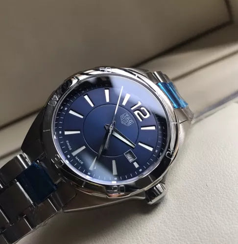 TAG Heuer watch with blue face