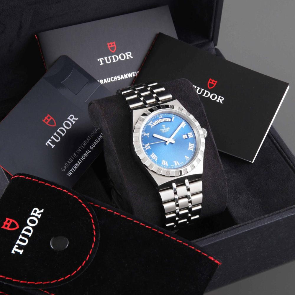 Tudor watch H22848-L274816433 with blue face, in box with paperwork.