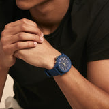 Man wearing blue watch