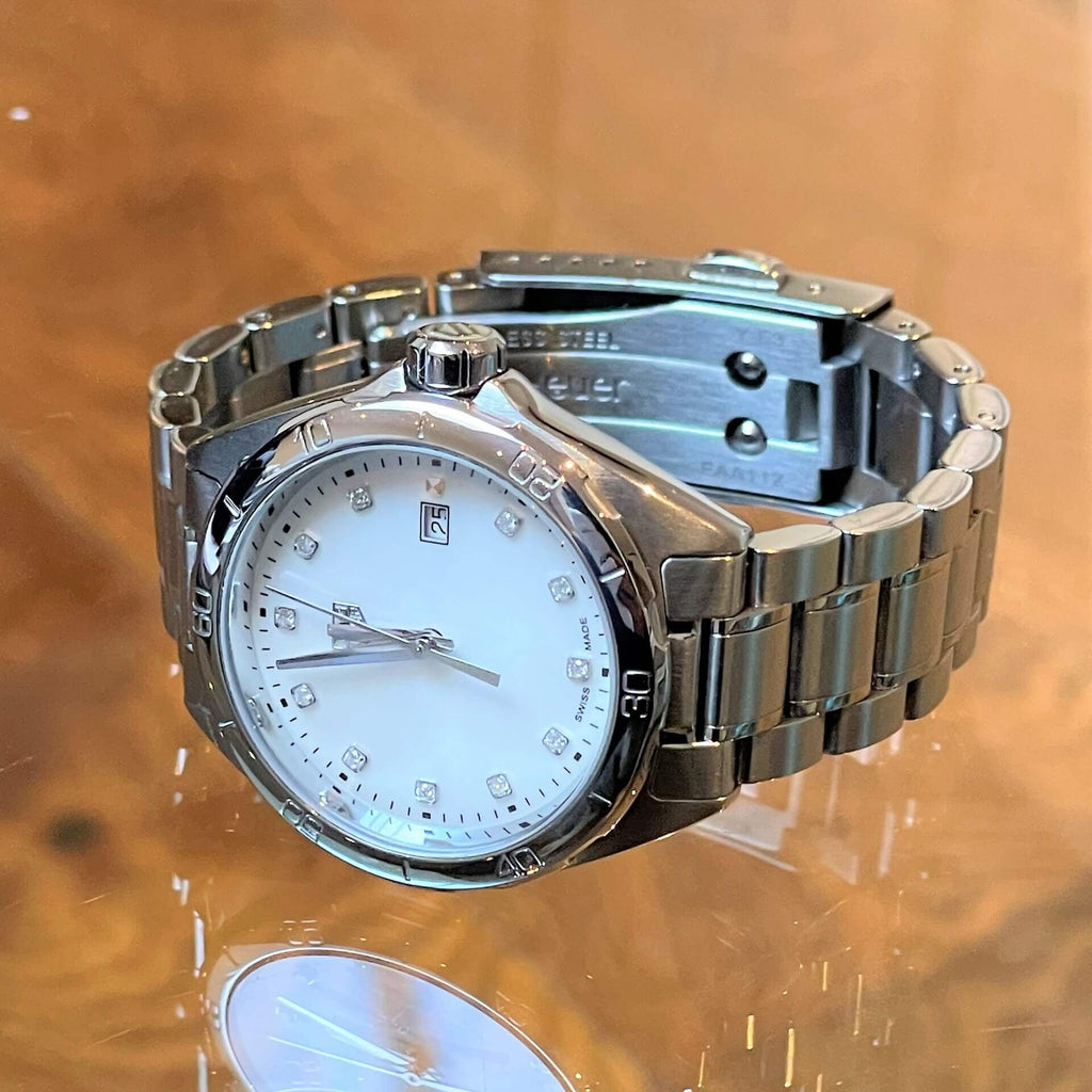 Stainless steel watch with diamond accents