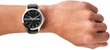 Men's black dial watch on wrist