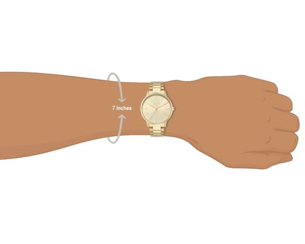 Gold watch on wrist, measuring 7 inches.