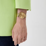 Gold watch on wrist, RTLABL750601