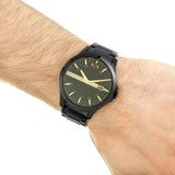 Black AX watch on wrist