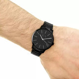 Armani Exchange black stainless steel bracelet watch on wrist