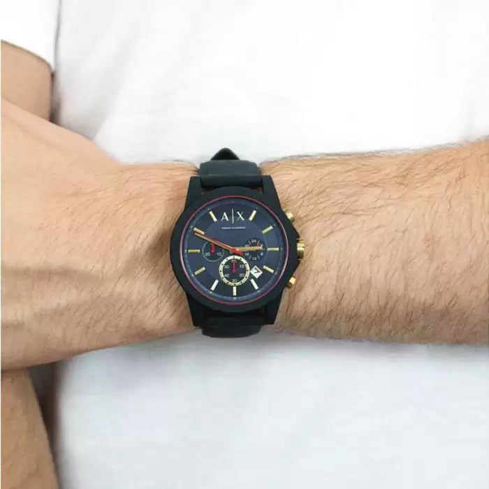 Armani Exchange blue silicone strap chronograph watch on wrist