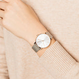 Rose gold watch on wrist