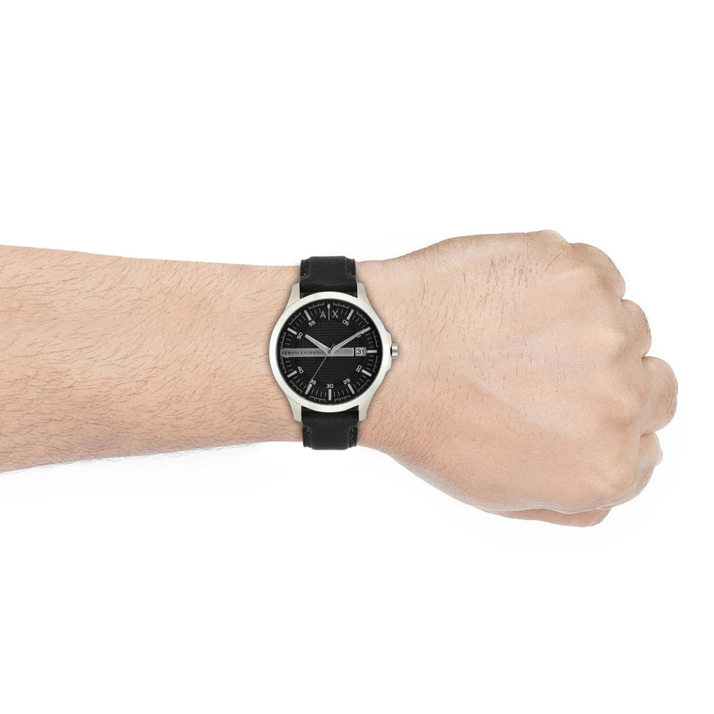 AX2101-3P watch on wrist with black leather strap