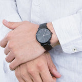 Grey AX2701 watch on wrist