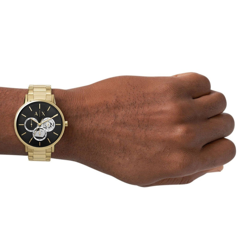 AX27473P10 gold watch on wrist
