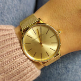 Armani Exchange AX5536-3 gold watch on wrist