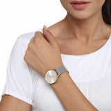 AX5537 watch on wrist with silver band