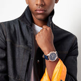 Man wearing watch, denim jacket, product fim3s4r93bux